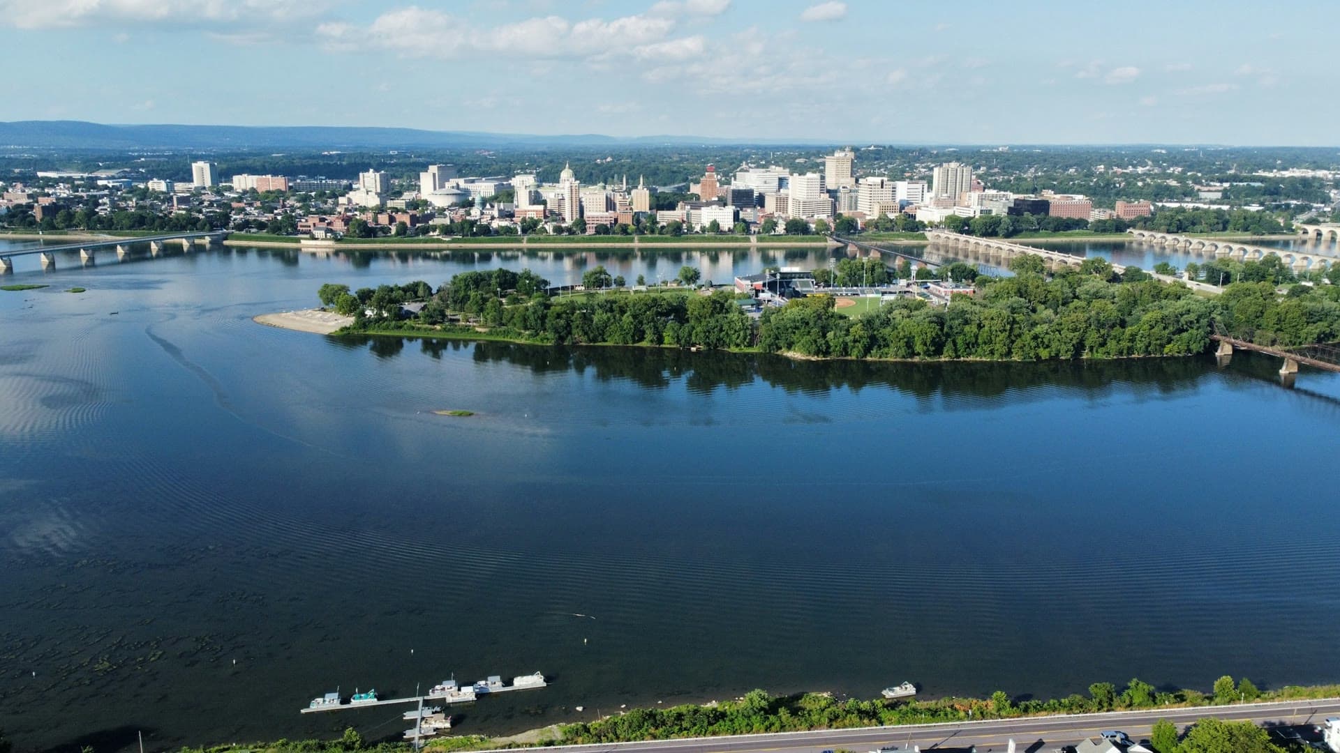 Downtown Harrisburg across the Susquehanna River, with City Island in front, seen from the West Shore